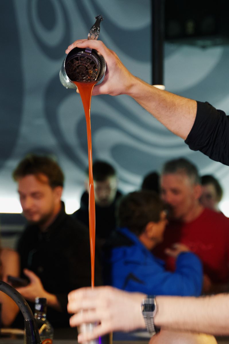 Long-pour cocktail being prepared at Qube Bar